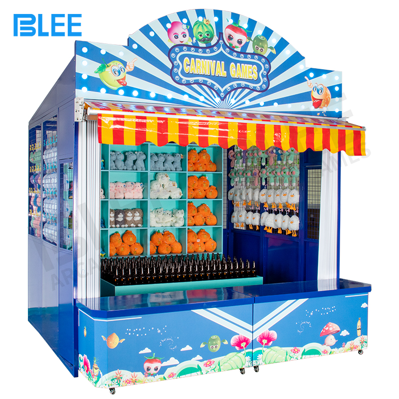 Ring Bottle Toss Game At A Traveling Carnival Game Booth