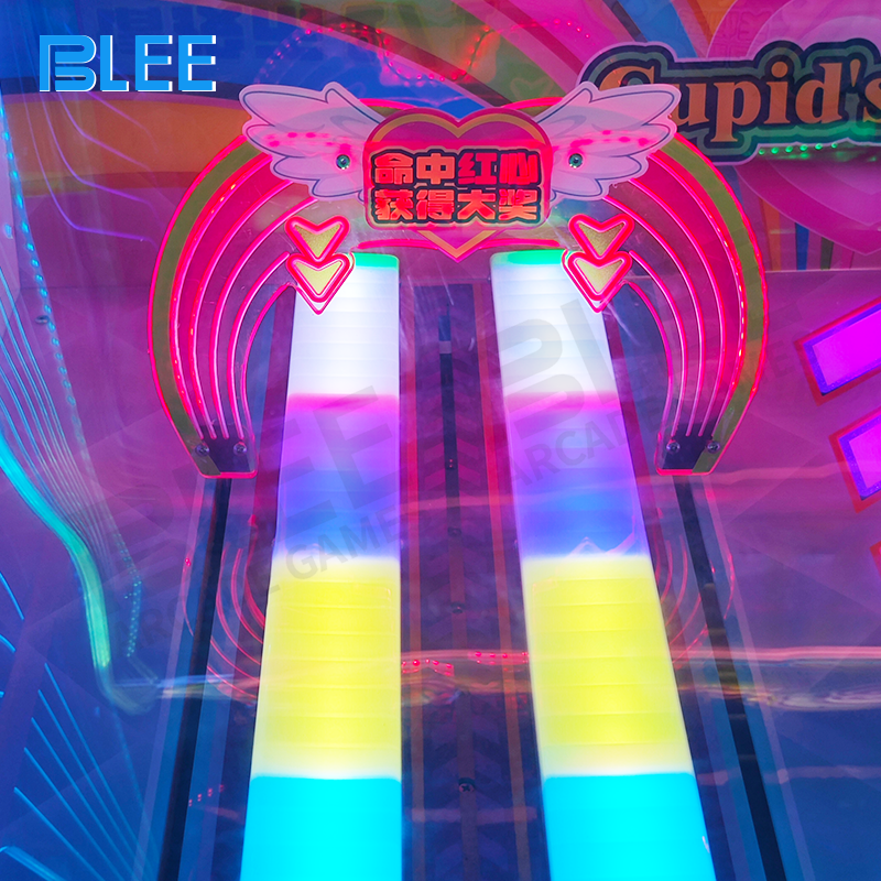 Professional installation team setting up the machine in arcade environment