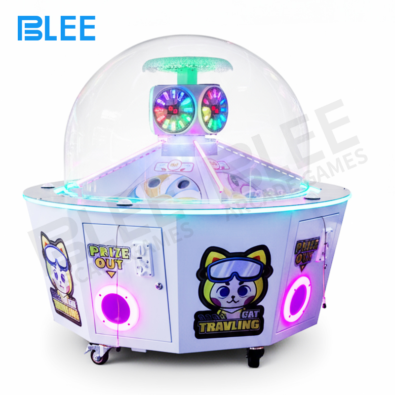 5-player arcade Internal view of the random selection mechanism and prize dispensing system