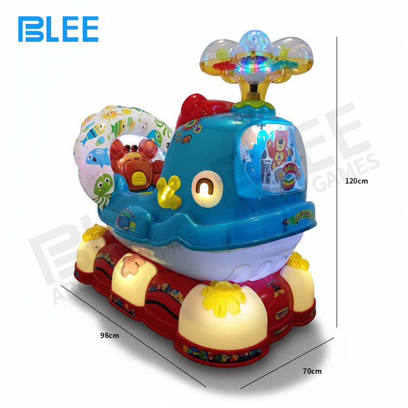 Close-up of the whale's cheerful facial features and decorative water splash elements