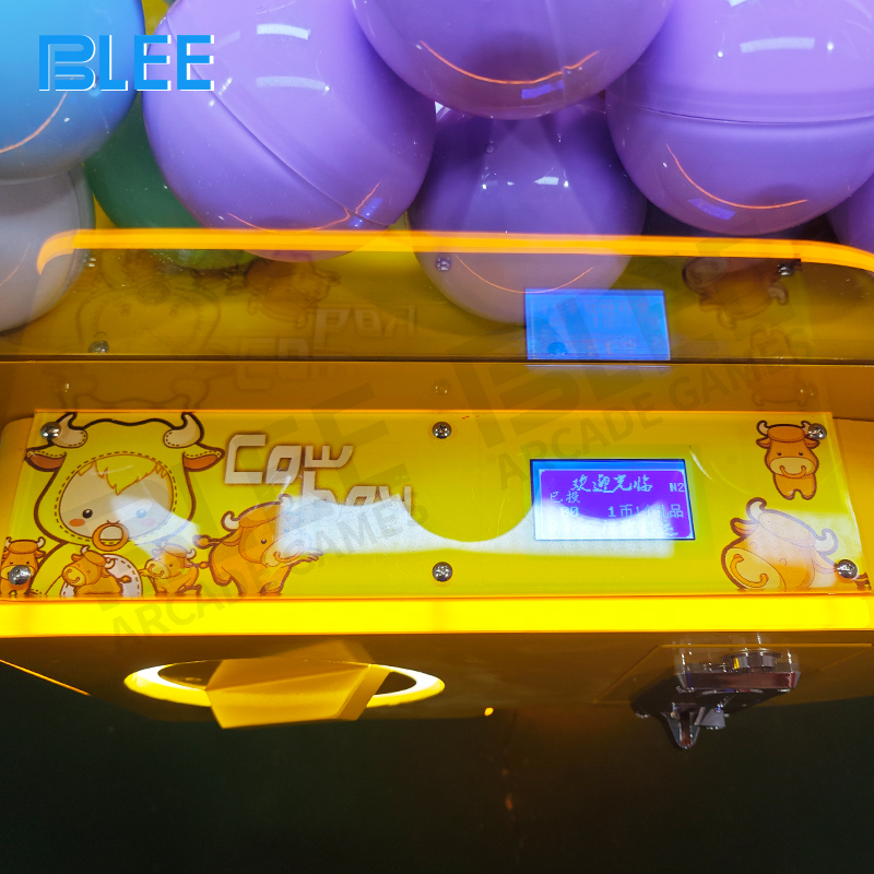 Customer engaging with dual payment: coin slot and QR code scanning options