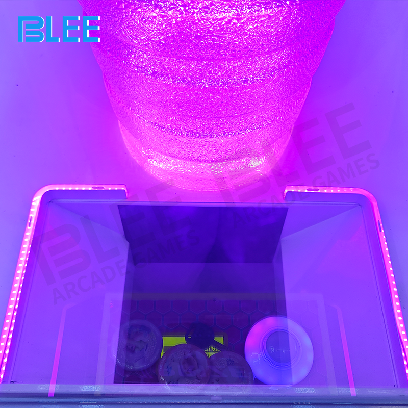 Player operating the joystick controls during gameplay