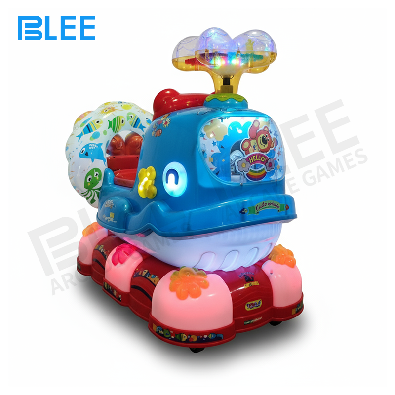 QQ whale kiddie ride Multiple QQ Whale units creating an aquatic mammal play zone