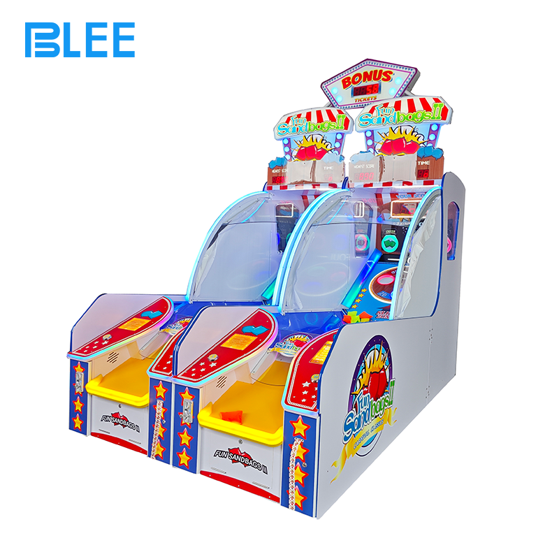 Throwing Sandbags Game Competitive multiplayer action on sandbag throwing redemption game