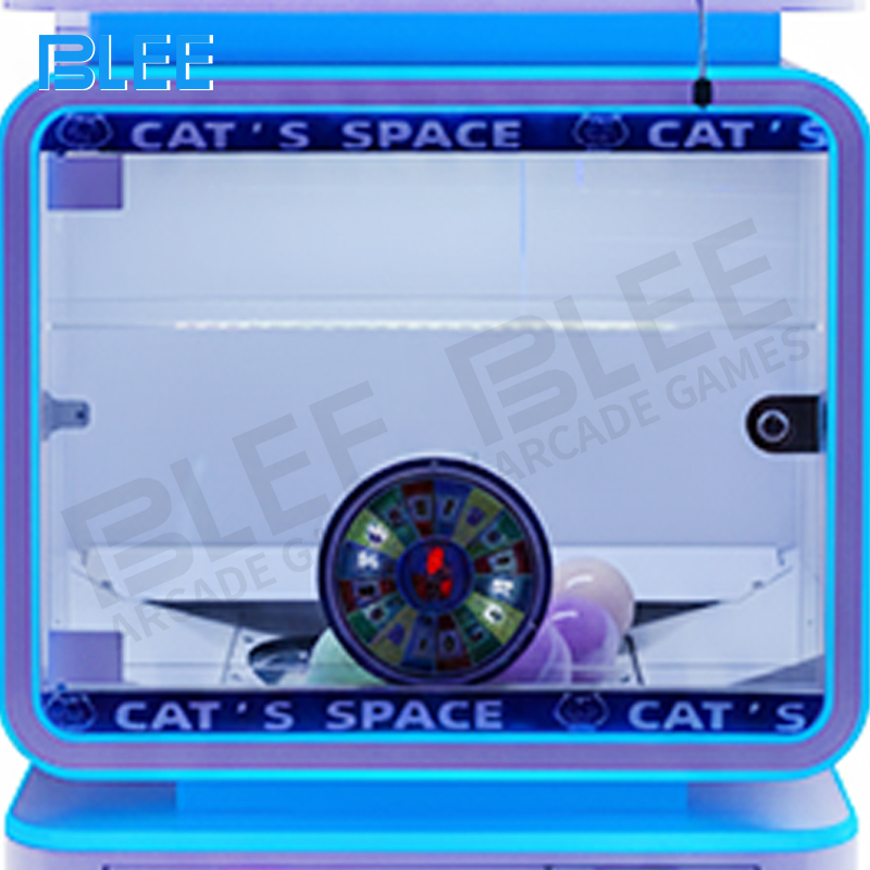 Capsule dispensing mechanism delivering prize to collection tray