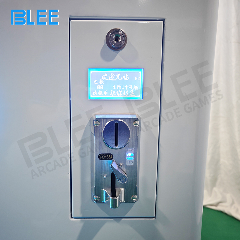 Customer engaging with dual payment options: traditional coin slot and QR code scanner