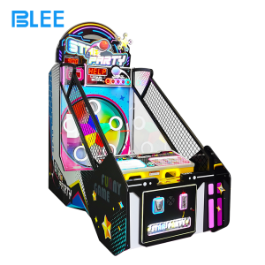 Close-up action shot of player throwing ball at rotating colored light targets with precision timing