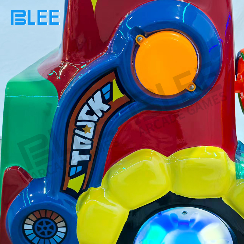 Control panel close-up featuring start button, motion controls, and interactive sound buttons