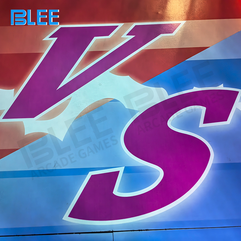 Two players intensely focused on dual 75-inch infrared touch screens during timed challenge