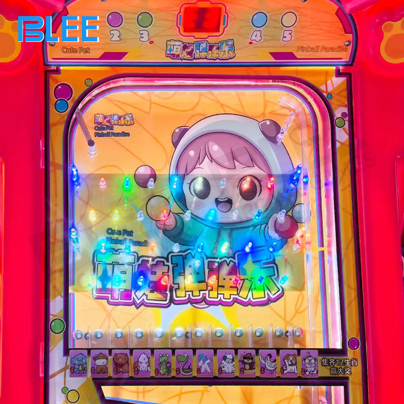 Young player engaged with the extra-large marble tracks and flippers