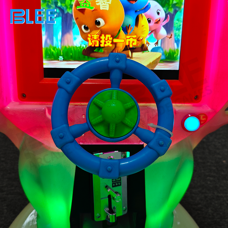 Close-up of the ergonomic robotic-themed seats with safety harnesses and interactive control panels