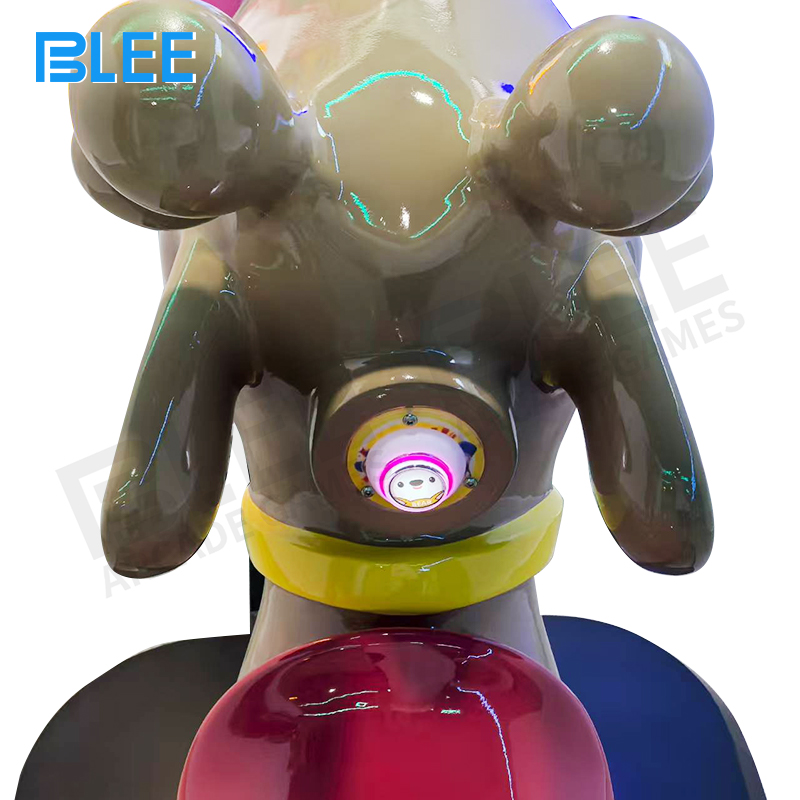 Interactive control panel with media selection buttons, volume control, and game mode options