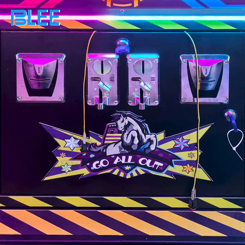 Child reaching to collect mystery box prize dispensing from the reward chute after winning