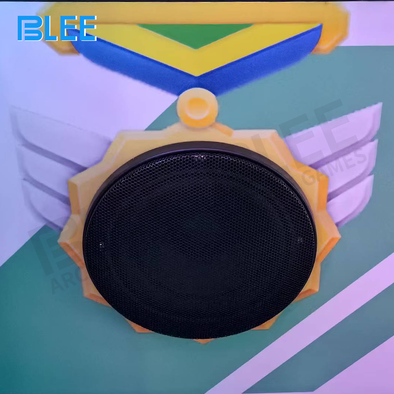 Installation in a busy family entertainment center with parents watching children play