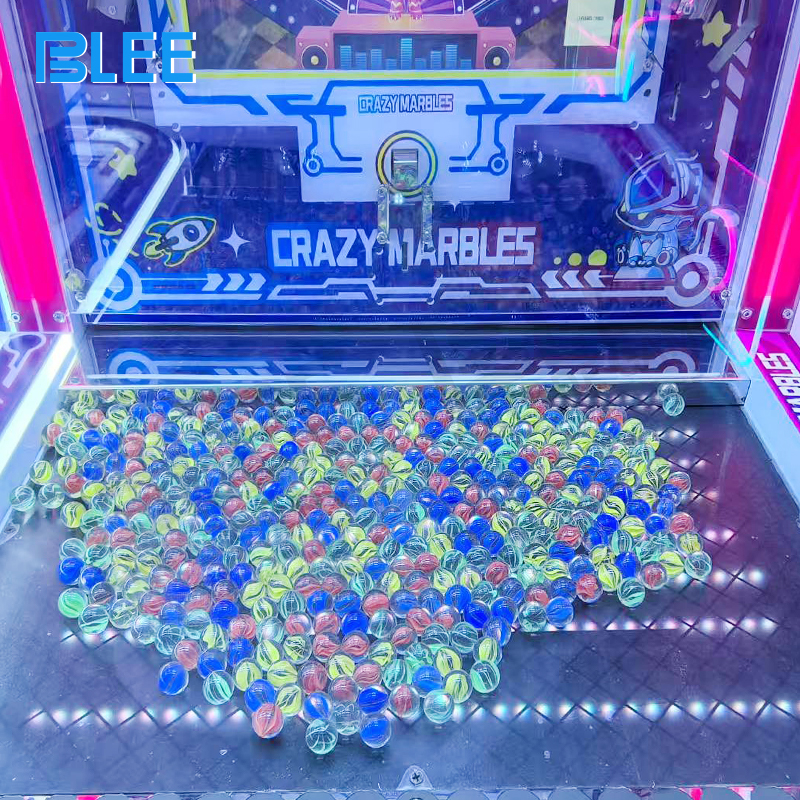 Ball dropping mechanism and playing field with prize distribution