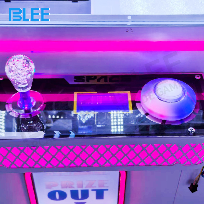 Crowd gathering around the illuminated machine during peak hours