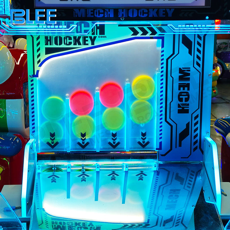 Close-up of the playing surface with 3-4 pucks in simultaneous motion, demonstrating enhanced gameplay dynamics