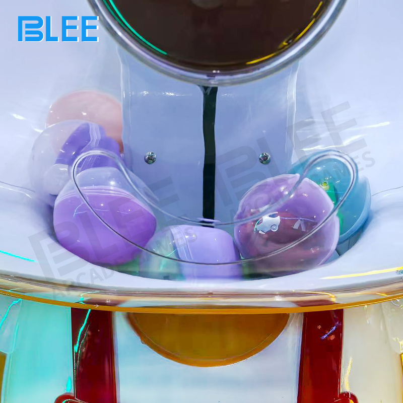 International customer receiving prize from the machine's output mechanism