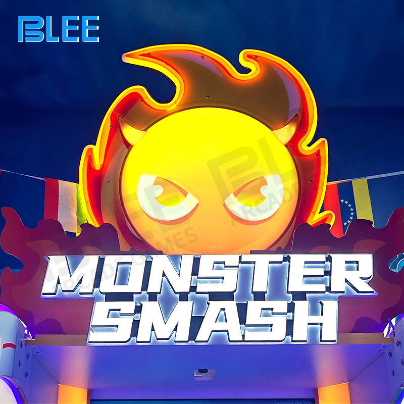 Player in action throwing a soft ball at animated monster targets on the 65-inch vertical screen