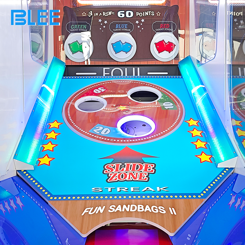 Family enjoying competitive sandbag throwing game together