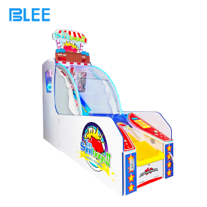 Professional installation process with BLEE technicians calibrating throwing mechanisms and scoring sensors