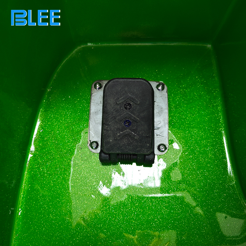 Dashboard close-up featuring the music player, volume controls, and power indicator.