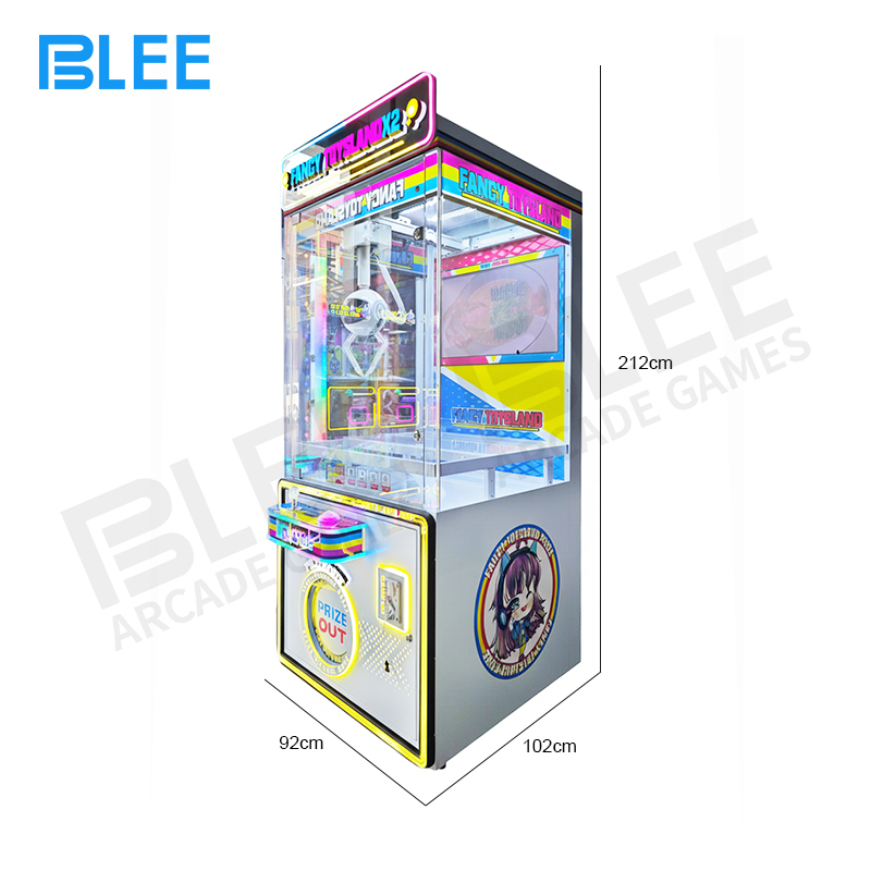 Close-up of two independent claw mechanisms operating simultaneously in prize chamber