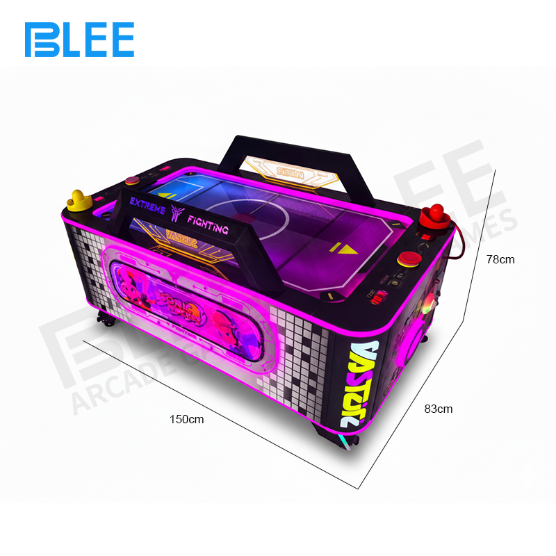 Close-up of the player controls and the digital display showing score and game mode.