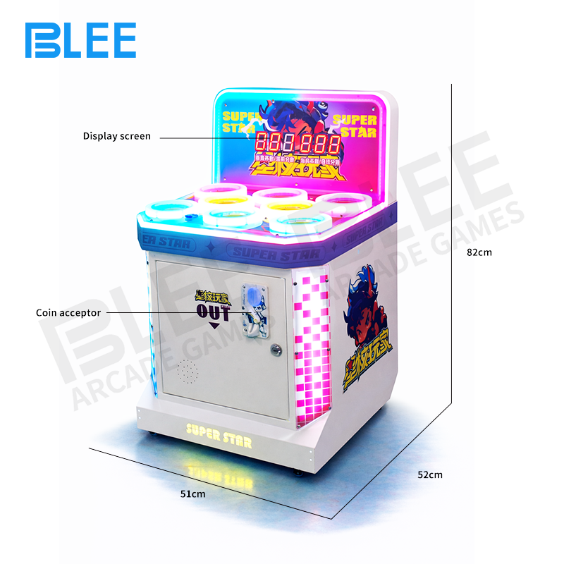 Close-up of the colorful mole targets in their holes on the playfield.