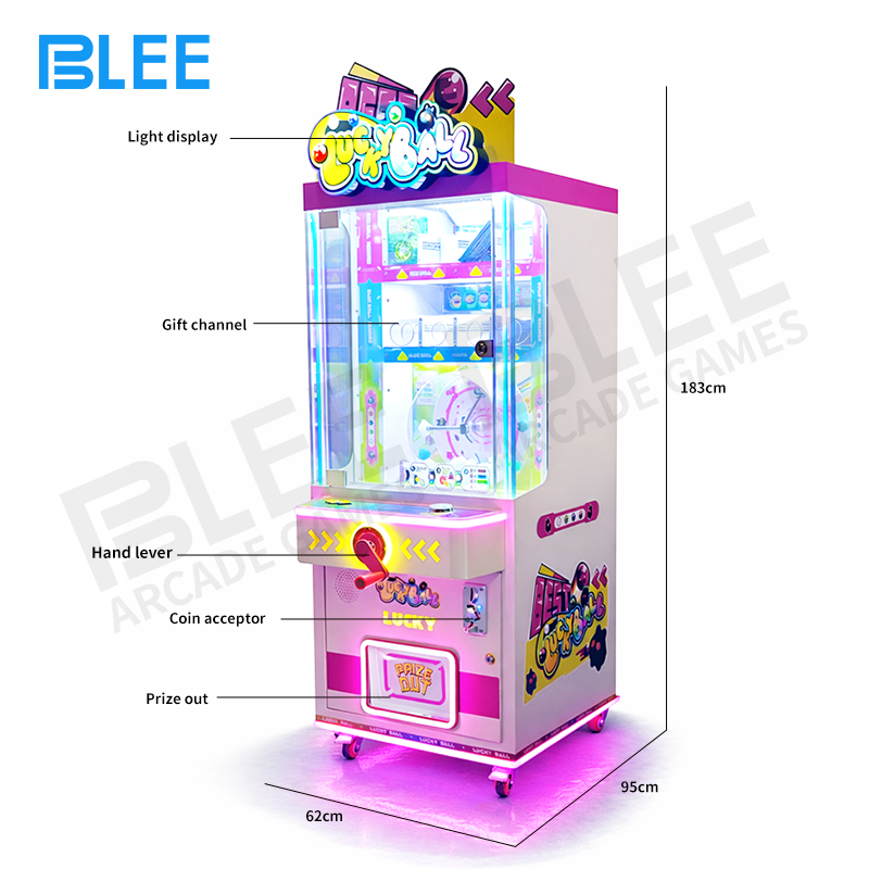 Player pressing the button to activate the shaker mechanism, starting the game.