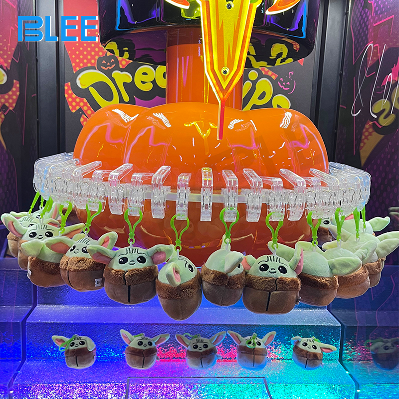 The moment a claw successfully grabs a prize, lifting it towards the prize chute.