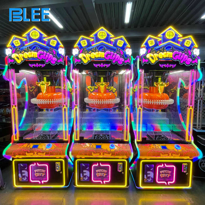 Two players side-by-side, each controlling different claws in the same machine for simultaneous play.