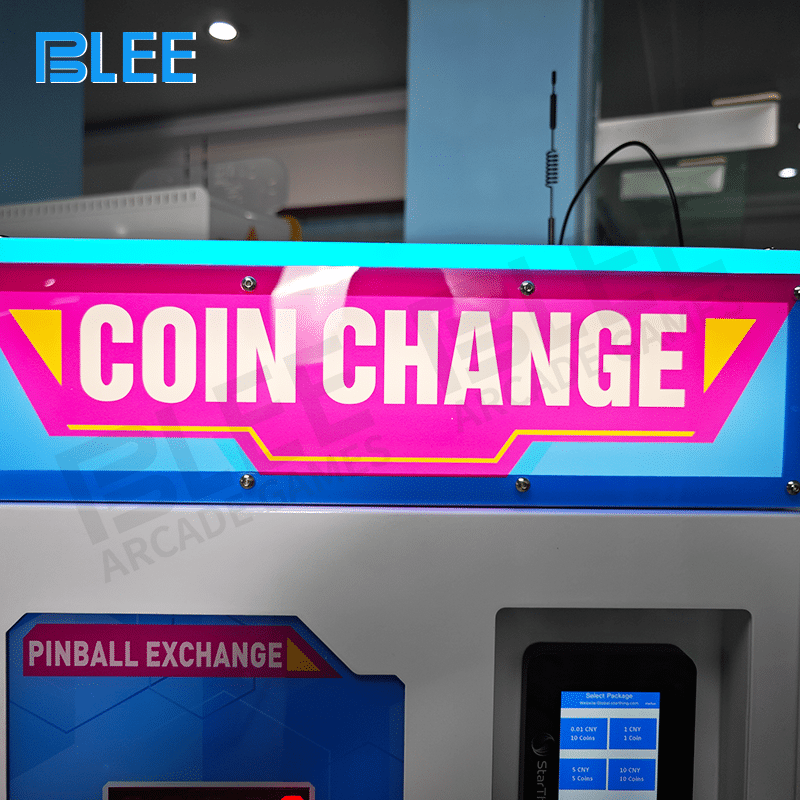 The YY3 dispenser installed in a convenient location along a wall in a busy arcade.