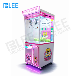 Close-up detail of two independent claws positioned over shared prize collection