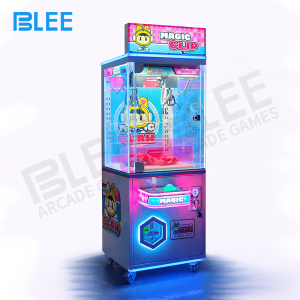 A player strategically controlling both joysticks for a coordinated dual-claw capture.