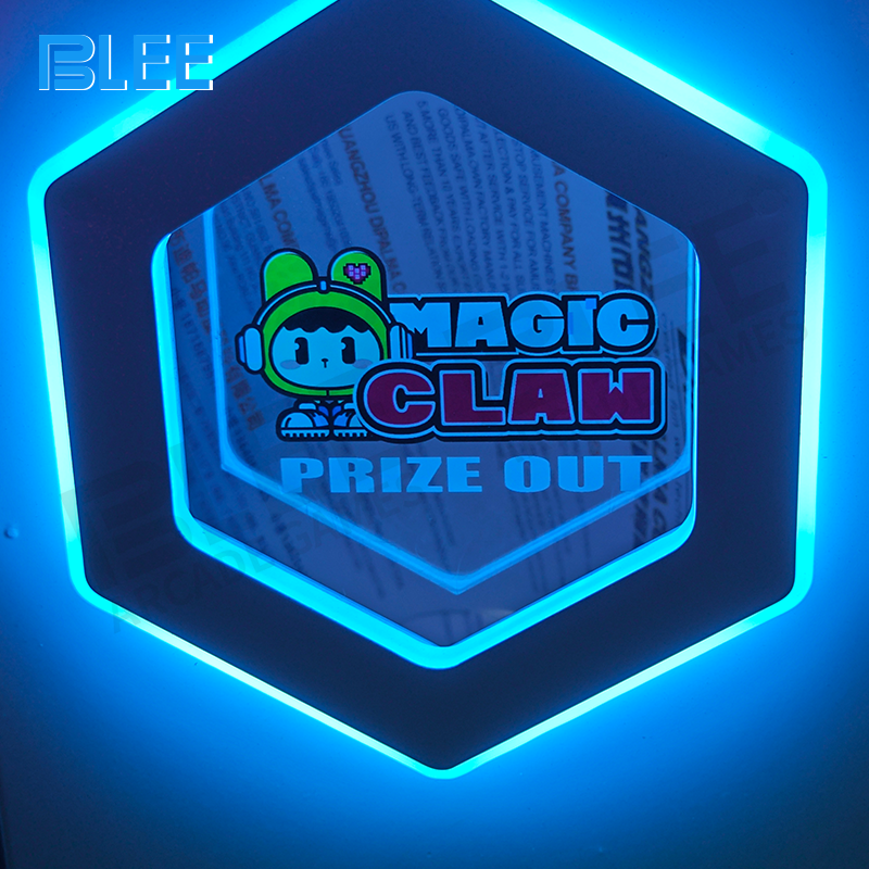 Integrated LED lighting that accentuates the play area and prize display.