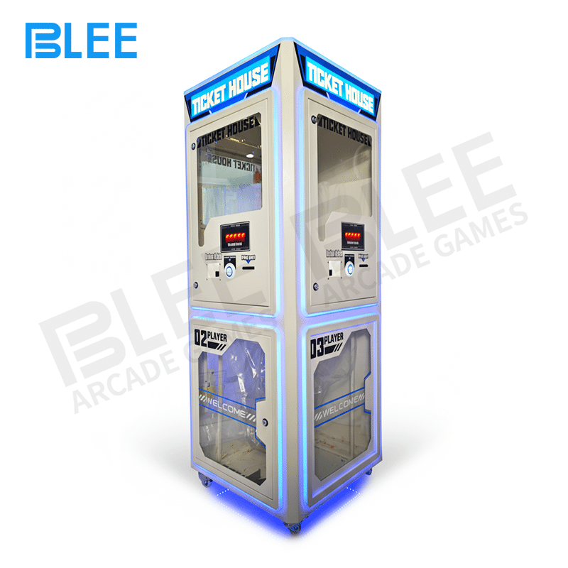 3-way coin exchange machine BLEE Triple-Side Ticket Shredder Coin Exchange Machine positioned centrally in a busy arcade.