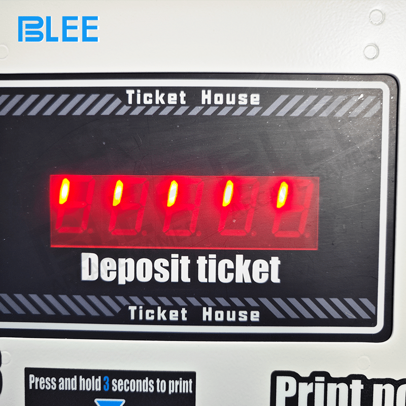 Multiple users simultaneously feeding tickets into the machine from three different sides.