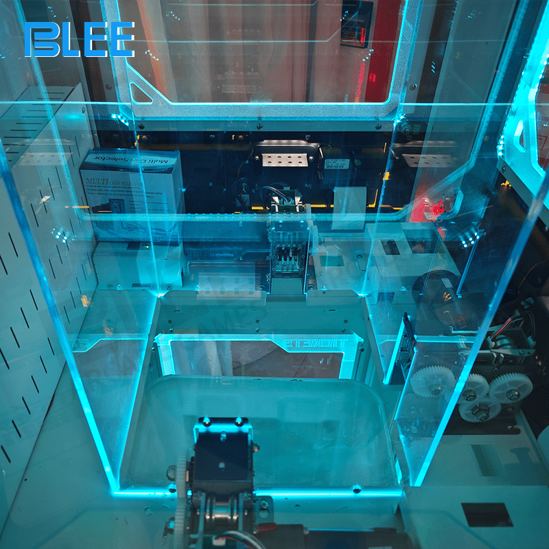 Coin dispensing mechanism with output tray for converted coins or tokens.