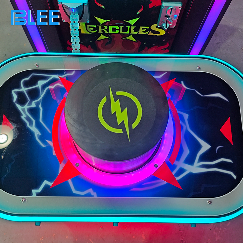 Action shot of hammer striking the target with LED run-way display lighting up progressively.