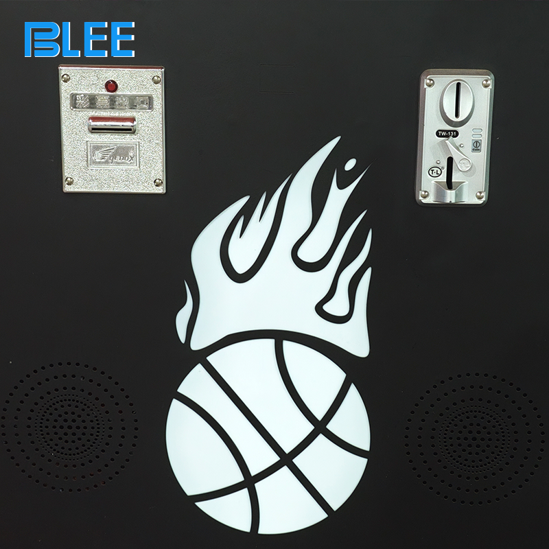 Player shooting a real basketball at the hoop with live scoring displayed on the LED screen.