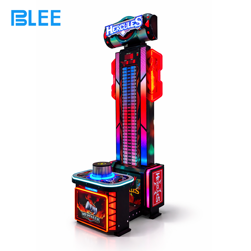 hammer swing arcade Player inserting coins into the payment system to activate the 2-round hammer challenge.