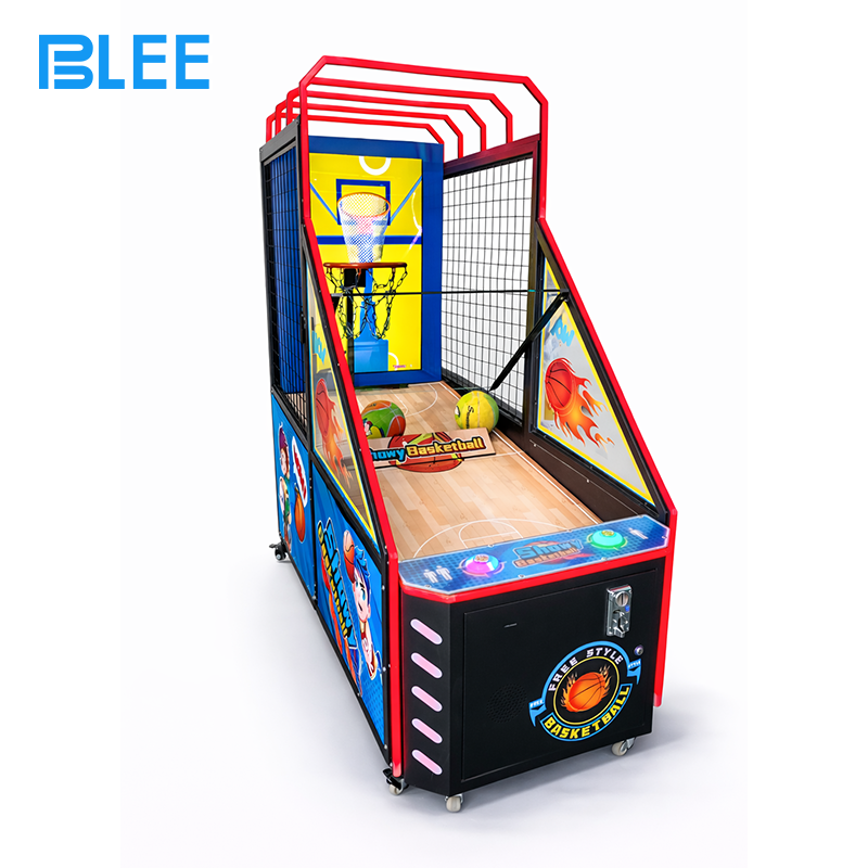 interactive kids basketball Close-up of prize dispensing mechanism delivering small toys to excited young winners