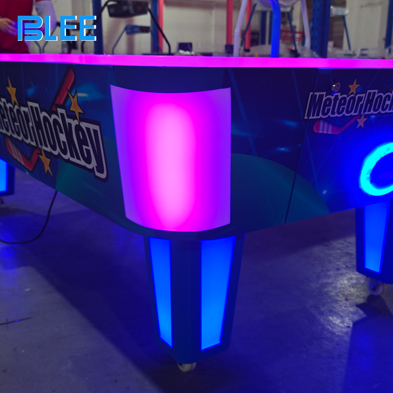 Close-up of tickets being dispensed to the winning player after match completion.