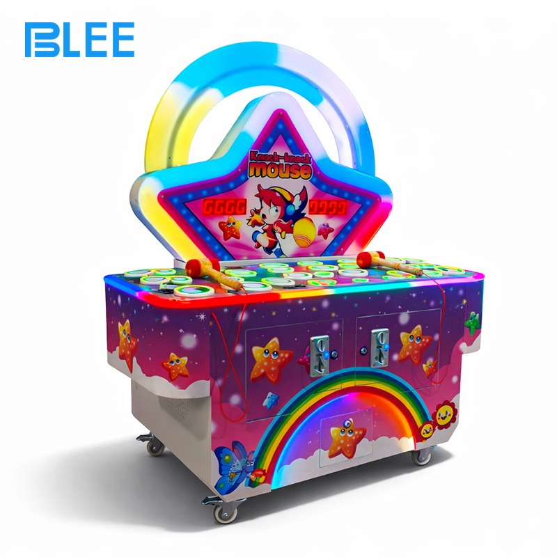 star knock mouse Player inserting coins to begin gameplay on the kids’ whack game.