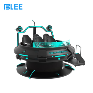 Five players seated inside the UFO cabin wearing headsets during an intergalactic battle mission.