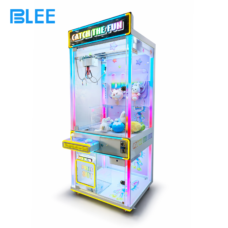 coin-operated claw game (3) Close-up of the precision claw mechanism gripping a branded plush toy inside the glass display.