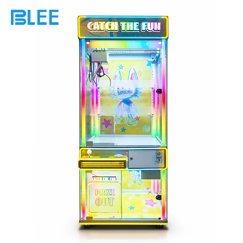 coin-operated claw game (4) Player using the joystick to position the claw over a selection of colorful prizes.