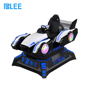 Close-up of the force-feedback steering wheel showing paddle shifters and control buttons.