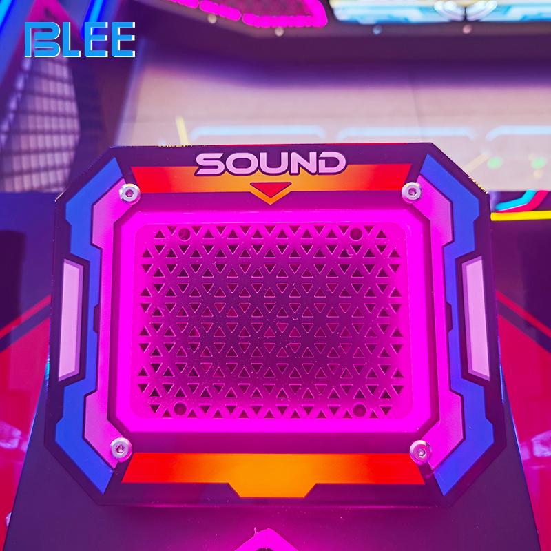 Player inserting coins into the payment system to join the 4-player battle.